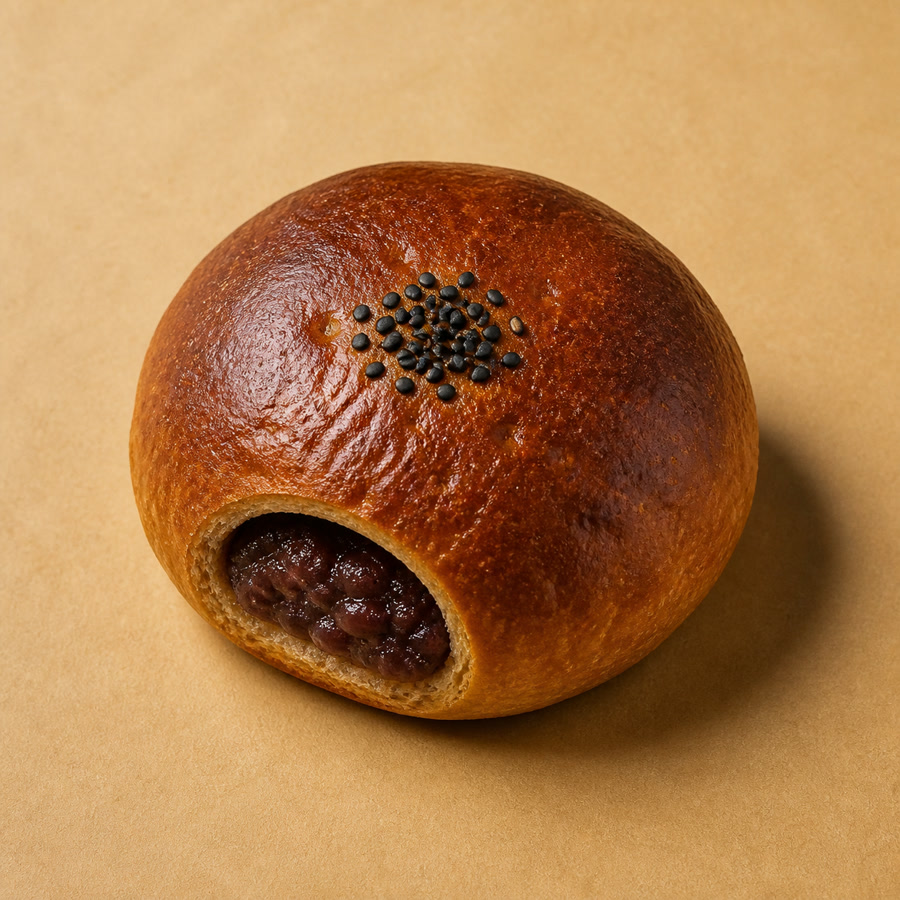 黒胡麻をのせた黒糖あんぱん